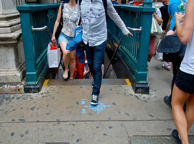 NYC sidewalk graffiti helps orient subway commuters